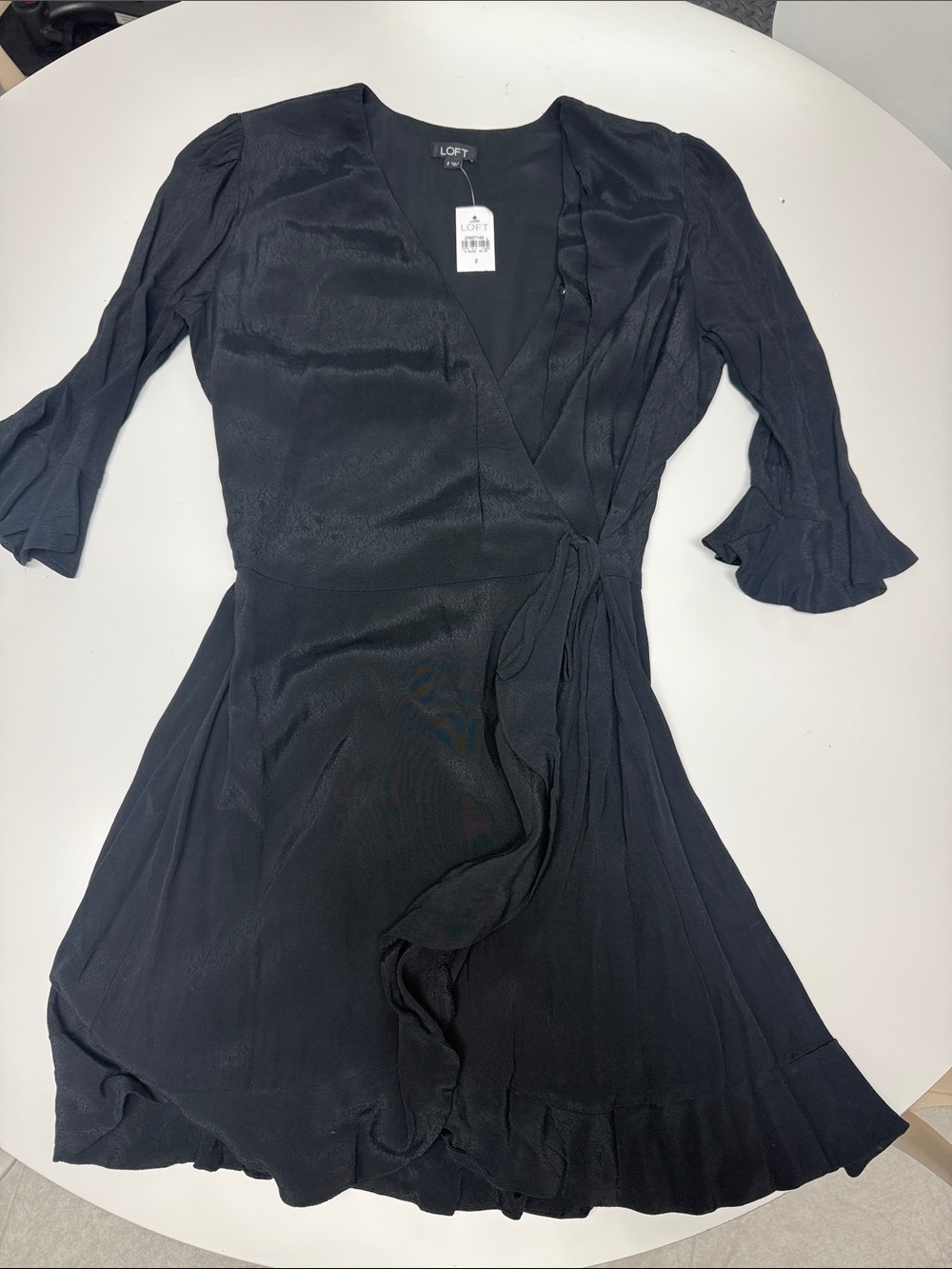 NWT LOFT Black Wrap Romper with Ruffle Sleeves